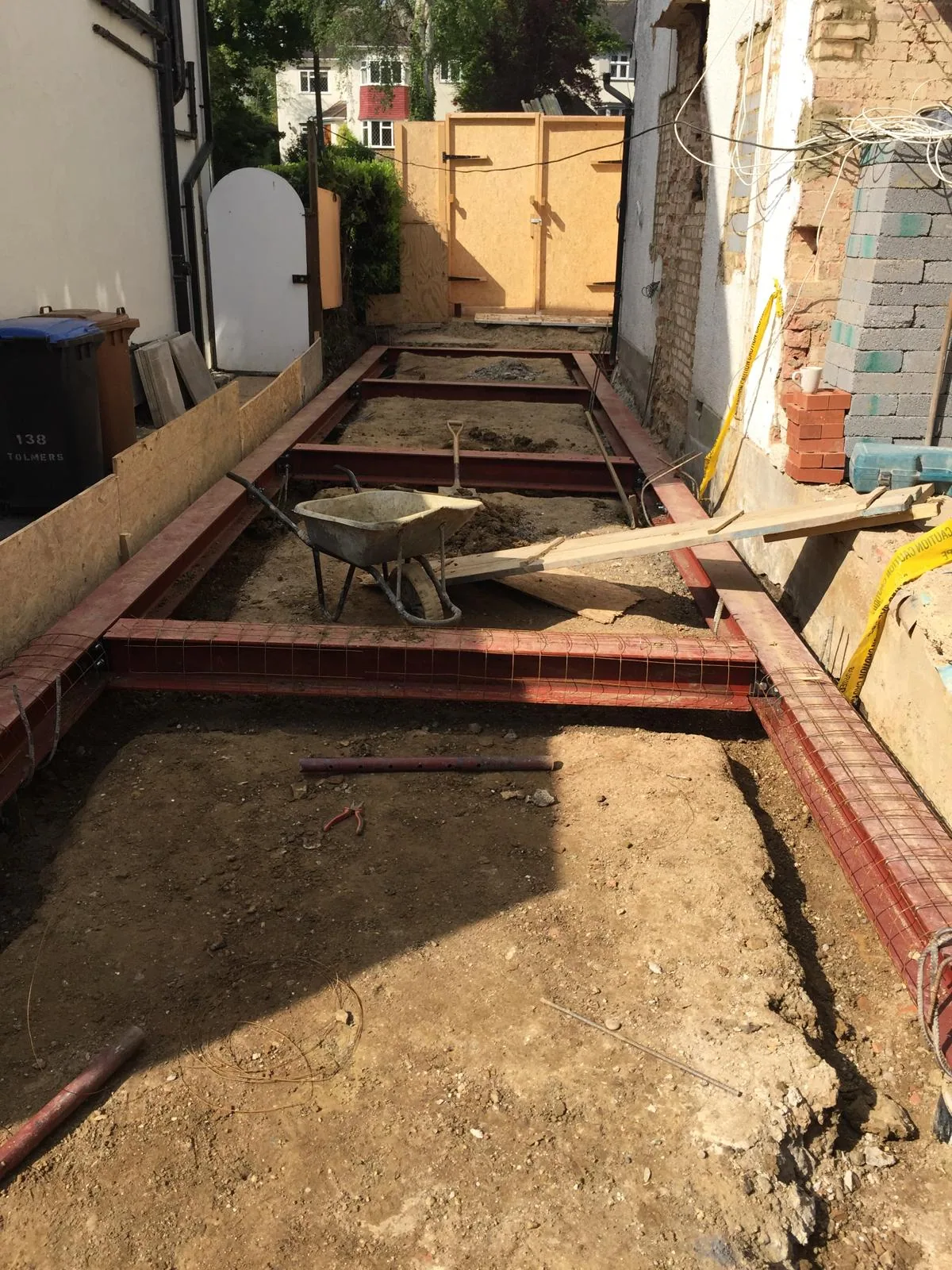 Residential interior with flooring and floor preparation underway.