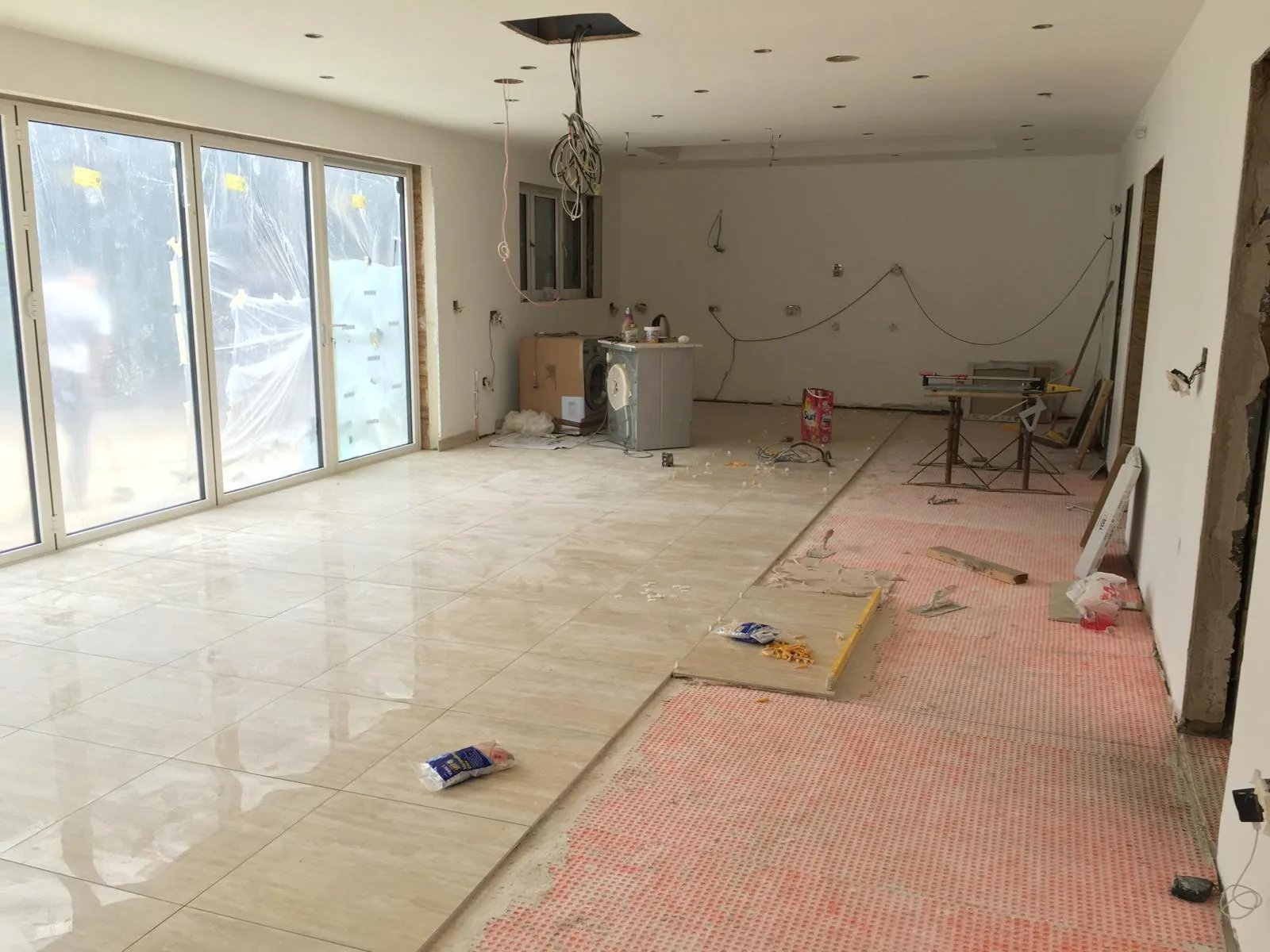 Internal structural alteration with exposed construction and new support works.