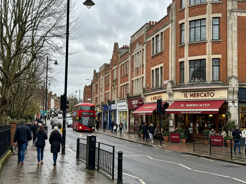 Muswell Hill Broadway N10 Edwardian shopping parade and red London bus