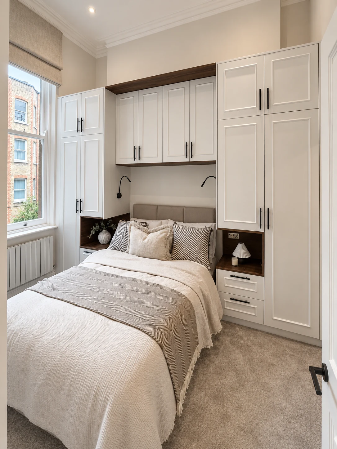 Bespoke neutral wardrobe joinery with discrete integrated handles