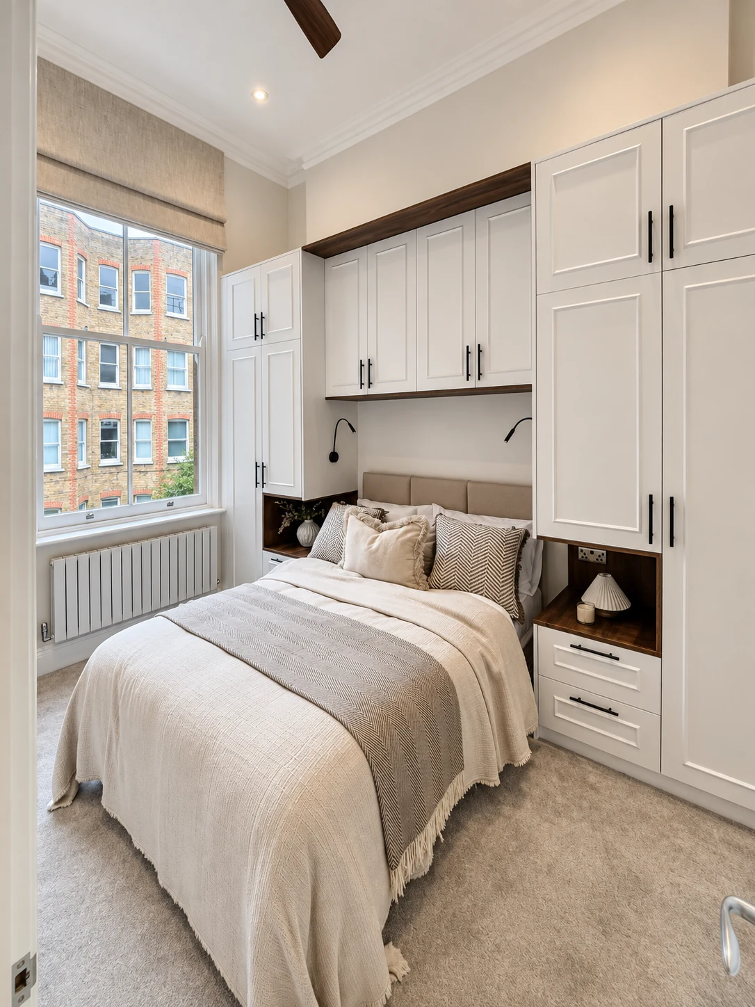 Principal bedroom suite with seamless neutral built-in wardrobes