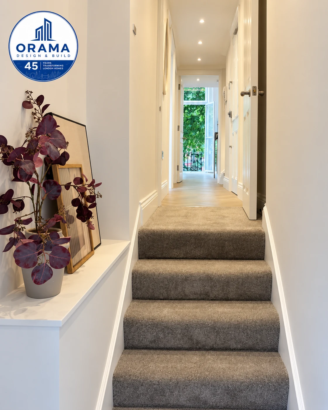 Modern London hallway with refined staircase and bespoke balustrade