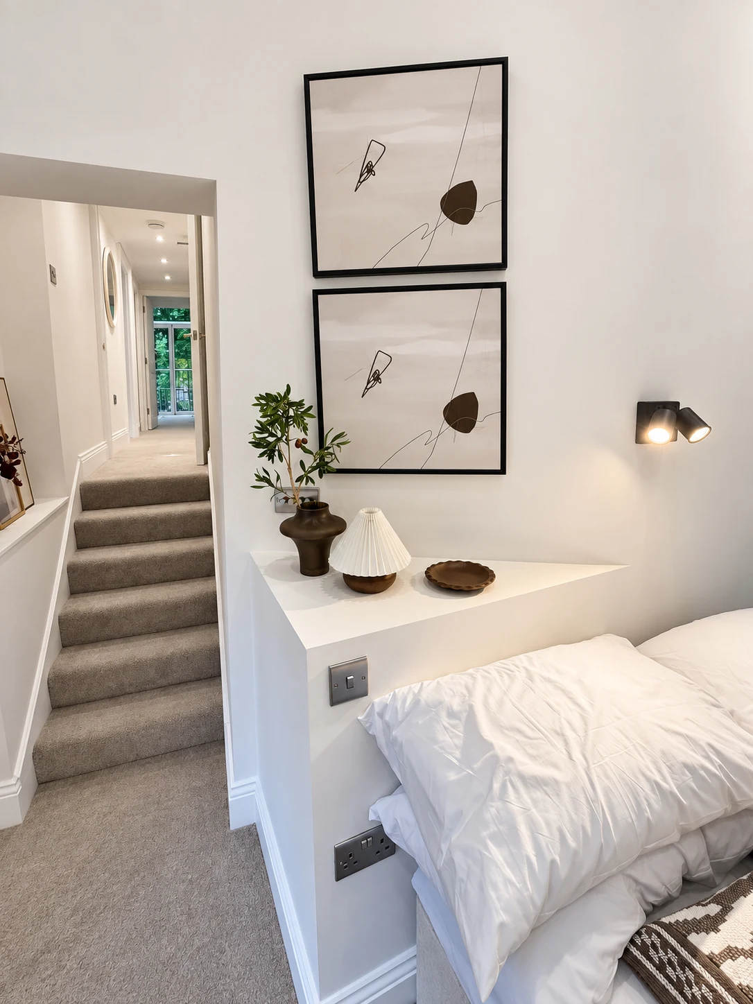 Minimalist modern bedroom with clean detailing and quiet tones
