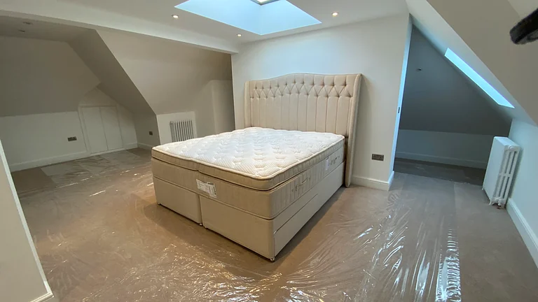 Luxury ensuite bathroom and bedroom in Hampstead loft conversion
