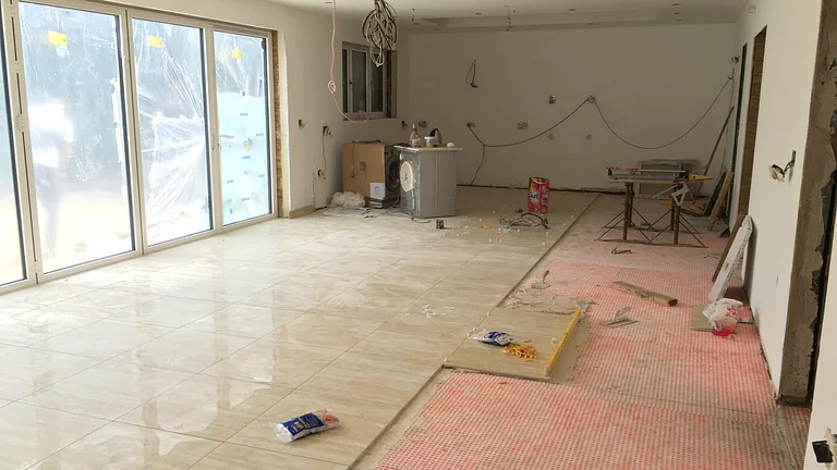 Large format bathroom tiling and underfloor heating in Potters Bar